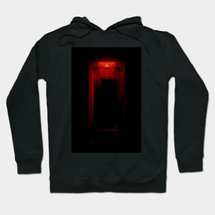 Digital collage, special processing. Room, corridor. Entrance to some dark place. Red. Hoodie